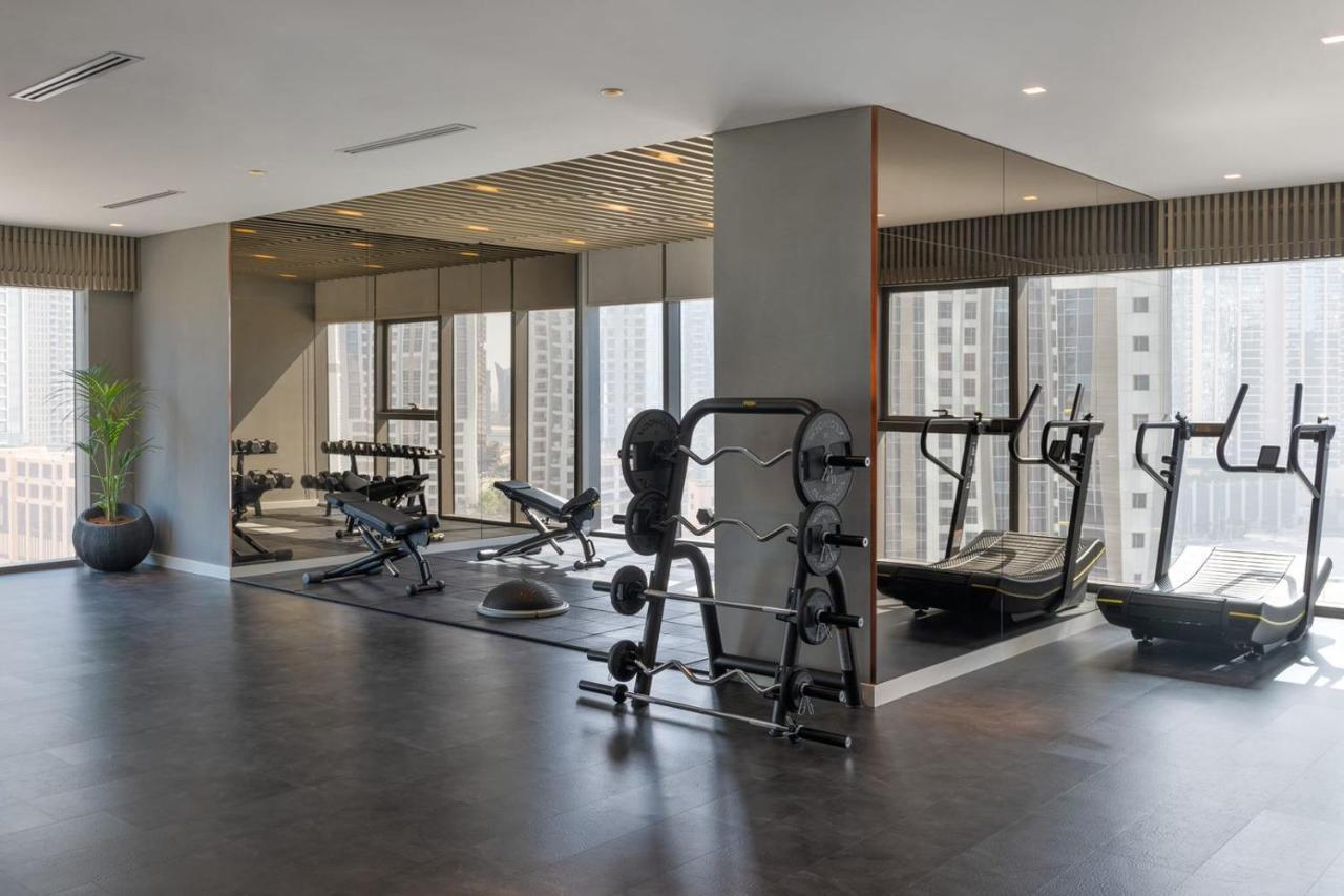 Paramount Hotel Midtown Dubai Exterior foto The gym at the 1018