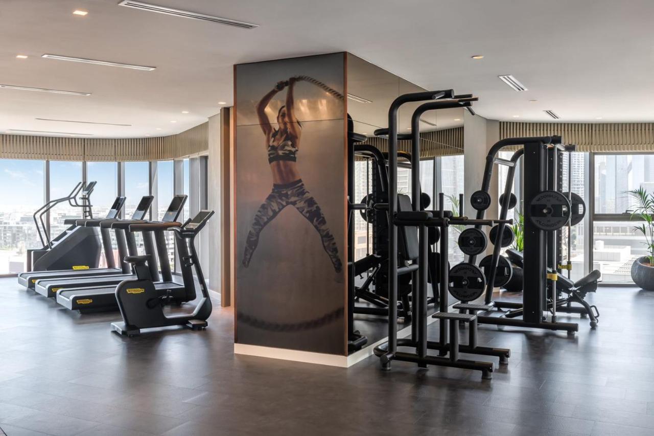 Paramount Hotel Midtown Dubai Exterior foto The gym at the hotel