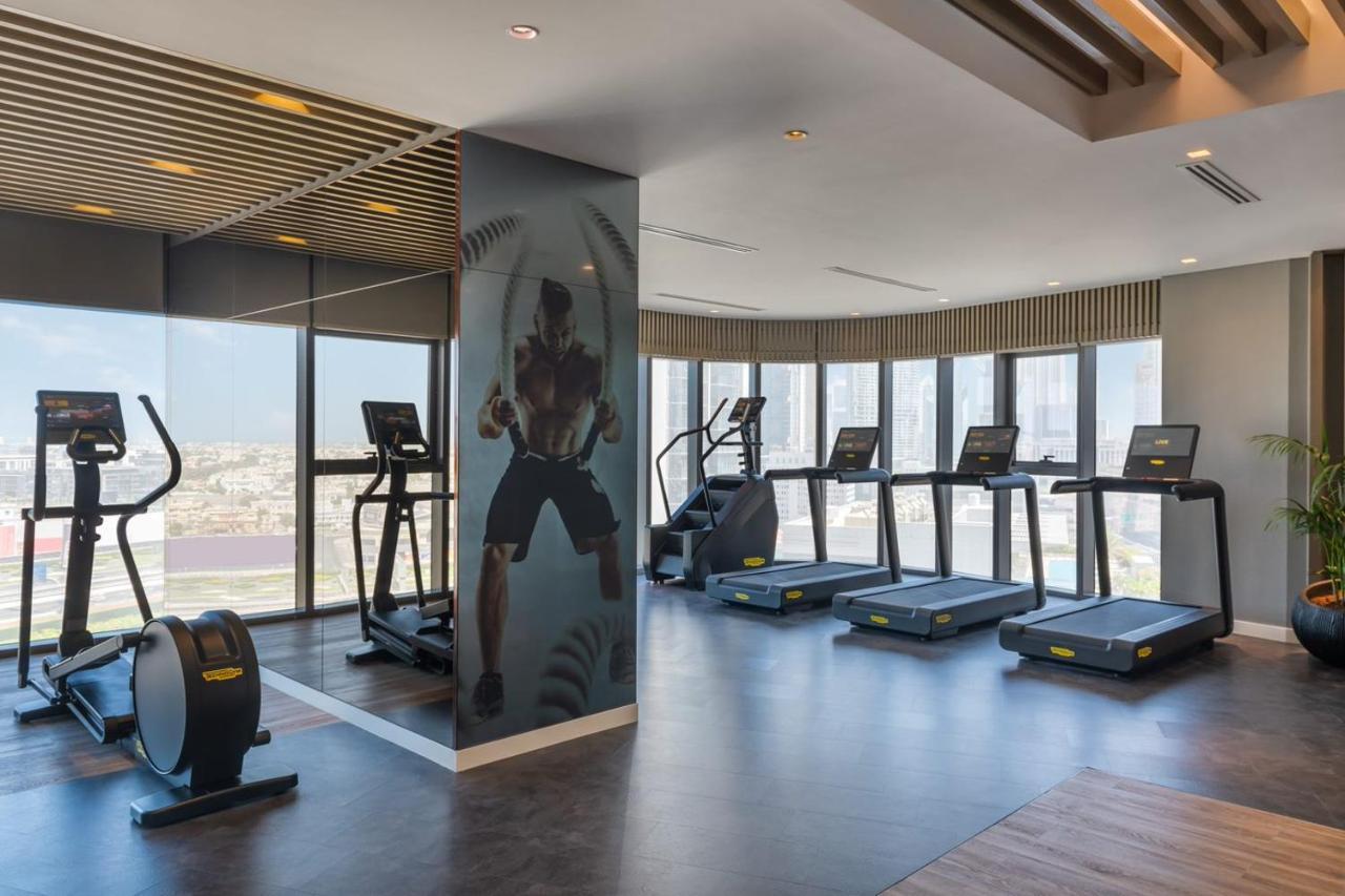 Paramount Hotel Midtown Dubai Exterior foto The gym at the hotel
