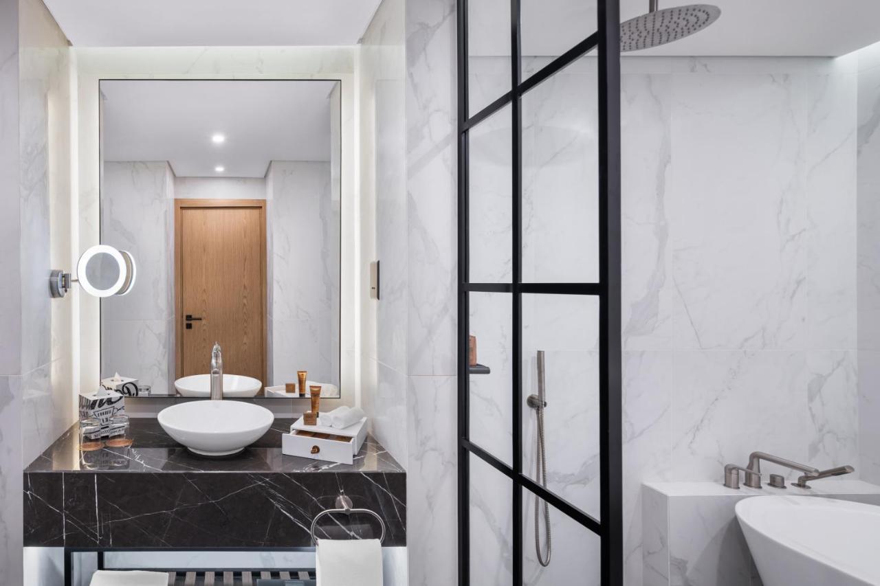 Paramount Hotel Midtown Dubai Exterior foto Bathroom