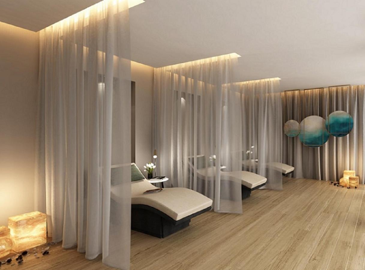 Paramount Hotel Midtown Dubai Exterior foto 3D rendering of a spa