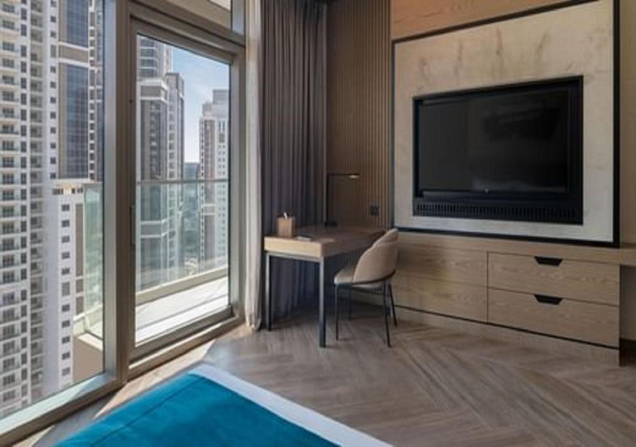 Paramount Hotel Midtown Dubai Exterior foto A bedroom at the hotel